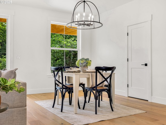 90190 Hobie Rd, Warrenton, OR 97146 - dining area with a chandelier and light wood finished floors