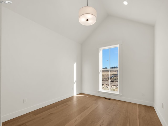 90190 Hobie Rd, Warrenton, OR 97146 - unfurnished room featuring light wood finished floors, vaulted ceiling, and recessed lighting