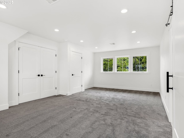 90190 Hobie Rd, Warrenton, OR 97146 - unfurnished bedroom featuring carpet and recessed lighting