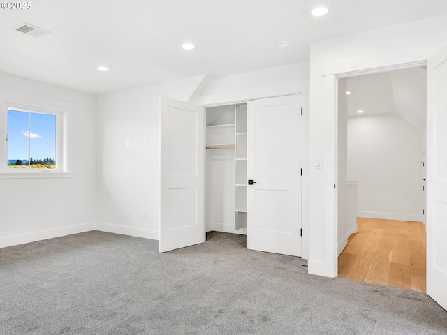 90190 Hobie Rd, Warrenton, OR 97146 - unfurnished bedroom featuring carpet flooring, recessed lighting, and a closet