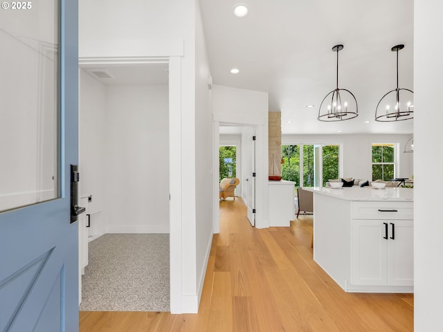 90190 Hobie Rd, Warrenton, OR 97146 - entryway featuring light wood-style floors, recessed lighting, and a chandelier