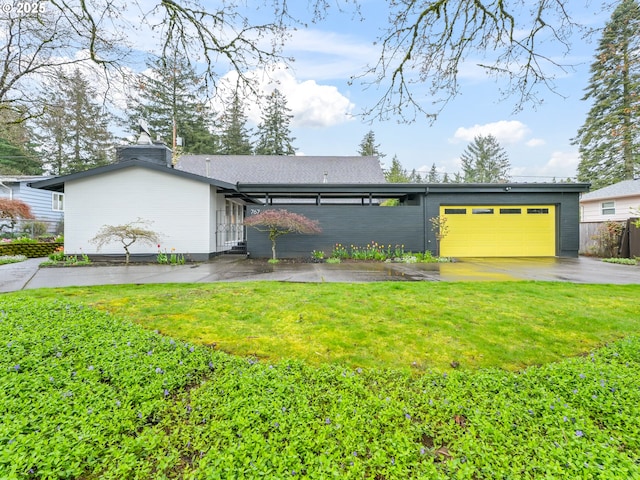 767 NE 152nd Ave, Portland, OR 97230 - view of front of home with an attached garage, driveway, and a chimney