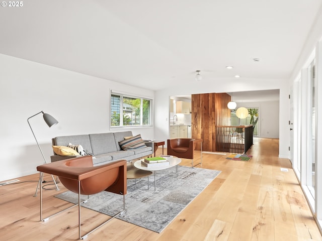 767 NE 152nd Ave, Portland, OR 97230 - living area with light wood-style floors and recessed lighting