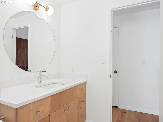 767 NE 152nd Ave, Portland, OR 97230 - bathroom with vanity and wood finished floors