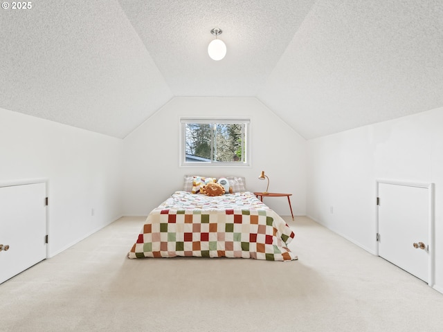 767 NE 152nd Ave, Portland, OR 97230 - bedroom featuring carpet floors, a textured ceiling, and lofted ceiling