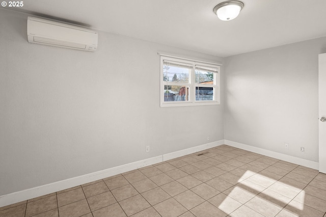 spare room featuring a wall mounted air conditioner