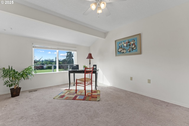 office featuring vaulted ceiling with beams, carpet, a ceiling fan, and visible vents