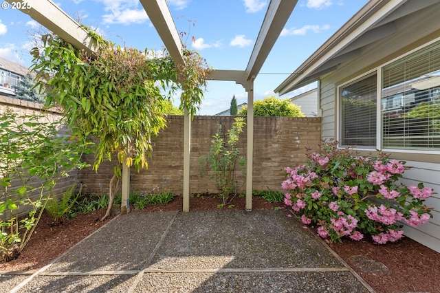 view of patio / terrace with fence