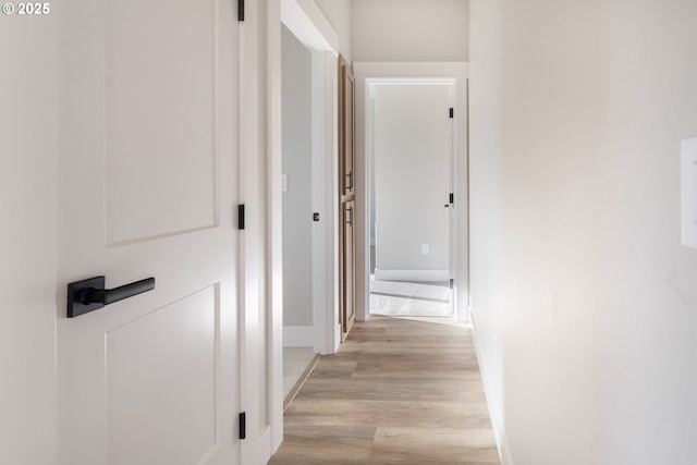 corridor featuring light wood-type flooring