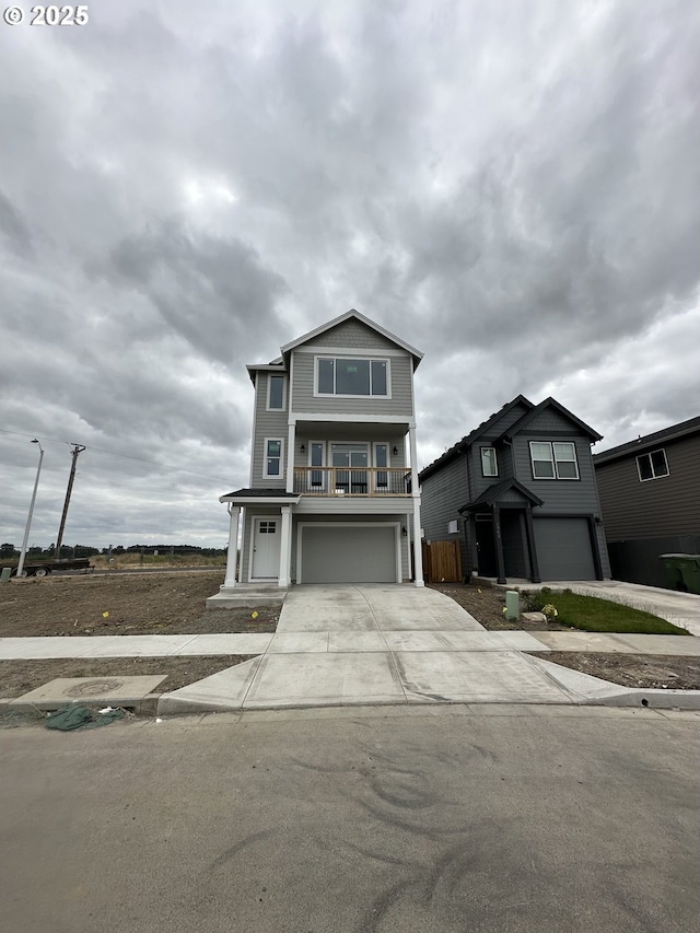 1775 S Murphy Dr, Newberg, OR 97132 - view of front of house with a garage, driveway, and a balcony