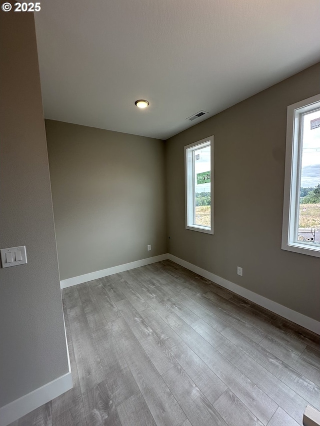 1775 S Murphy Dr, Newberg, OR 97132 - empty room featuring wood finished floors and baseboards