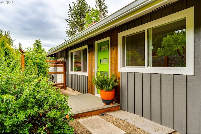 entrance to property featuring board and batten siding