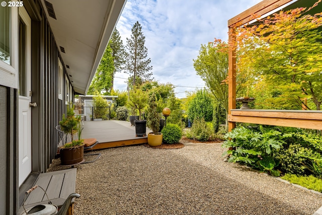 view of yard with a deck