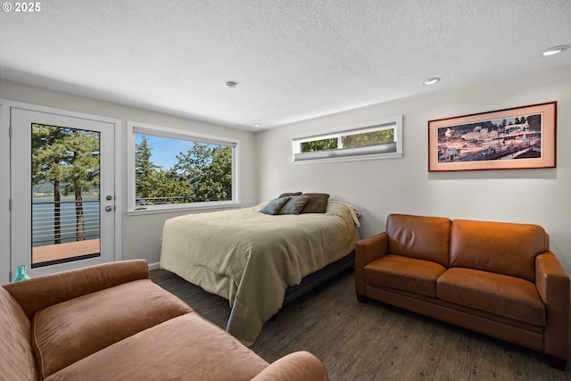 37333 NE Reed Rd, Corbett, OR 97019 - bedroom featuring access to outside, wood finished floors, a textured ceiling, and recessed lighting
