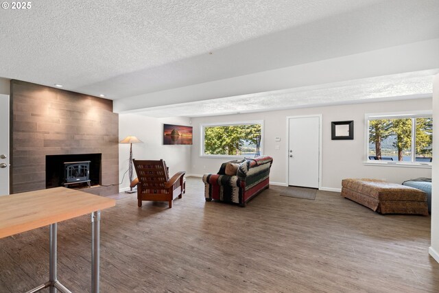 37333 NE Reed Rd, Corbett, OR 97019 - living area featuring wood finished floors, a textured ceiling, and recessed lighting