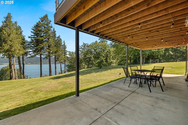 37333 NE Reed Rd, Corbett, OR 97019 - view of patio / terrace with a water view, outdoor dining space, and view of wooded area