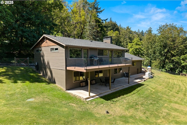 37333 NE Reed Rd, Corbett, OR 97019 - back of property with a chimney, a patio area, and a wooden deck