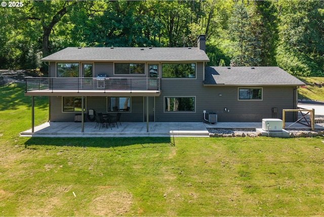 37333 NE Reed Rd, Corbett, OR 97019 - rear view of property with a patio, a chimney, a lawn, and a deck