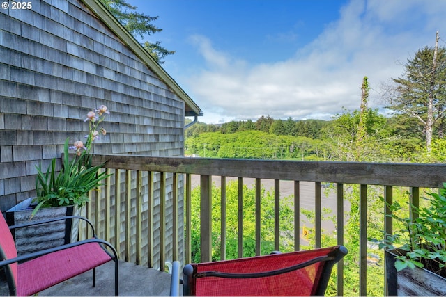 425 SE Shell Ave Unit 4, Depoe Bay, OR 97341 - balcony with a wooded view
