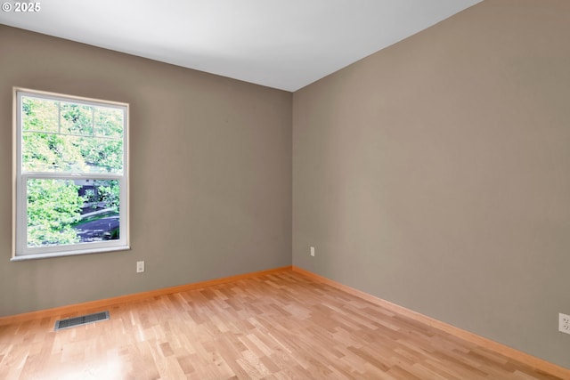 425 SE Shell Ave Unit 4, Depoe Bay, OR 97341 - spare room featuring wood finished floors and baseboards
