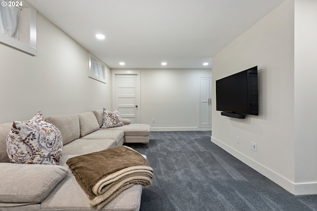 living room featuring recessed lighting, dark carpet, and baseboards