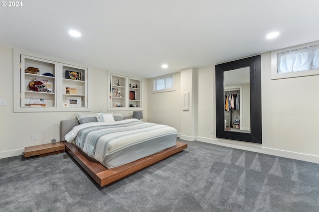 bedroom with baseboards, dark colored carpet, and recessed lighting