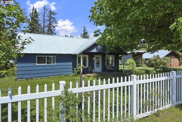 235 Bates Rd, White Salmon, WA 98672 - view of front of home with a fenced front yard and a metal roof