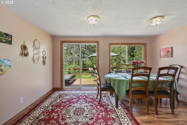 235 Bates Rd, White Salmon, WA 98672 - dining room with wood finished floors and baseboards
