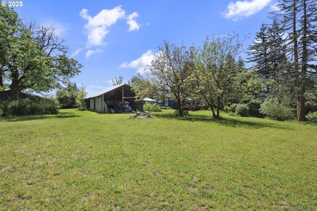235 Bates Rd, White Salmon, WA 98672 - view of green lawn with a pole building and an outbuilding
