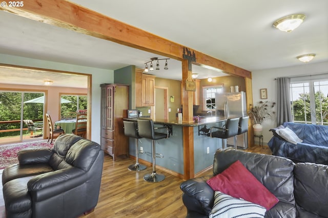 235 Bates Rd, White Salmon, WA 98672 - kitchen with open floor plan, healthy amount of natural light, wood finished floors, and beamed ceiling