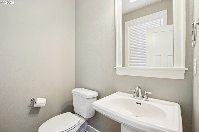 665 NE Skidmore St, Portland, OR 97211 - half bath with toilet and a sink