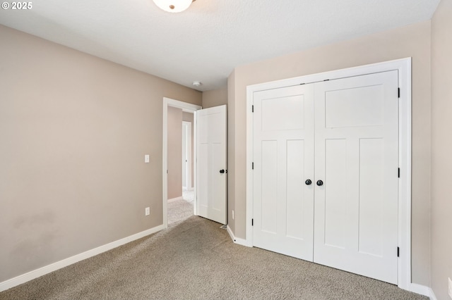 665 NE Skidmore St, Portland, OR 97211 - unfurnished bedroom with carpet flooring and a closet