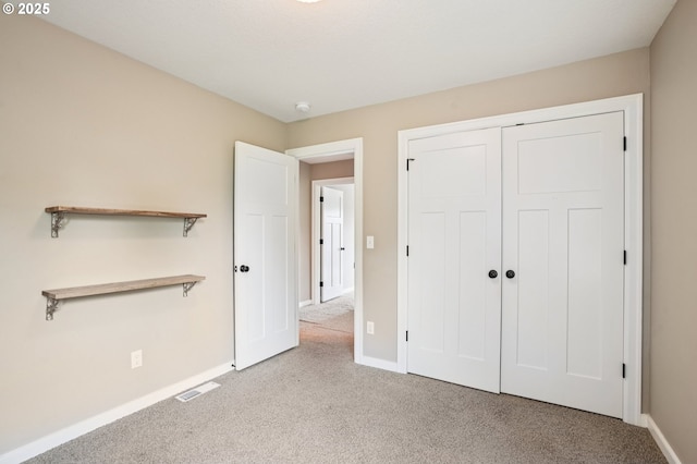 665 NE Skidmore St, Portland, OR 97211 - unfurnished bedroom with carpet floors and a closet