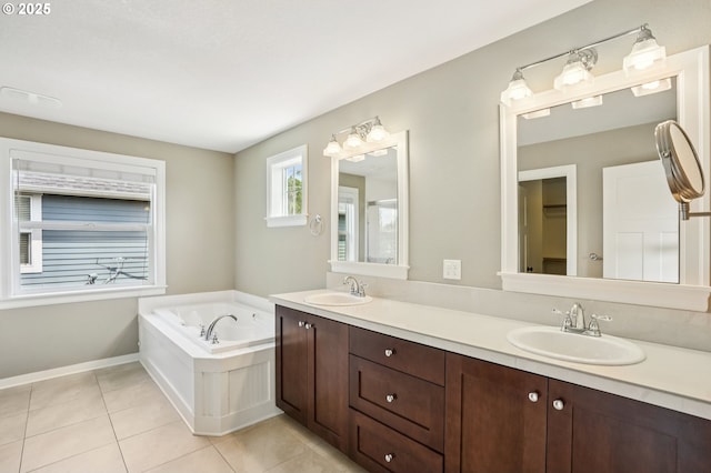 665 NE Skidmore St, Portland, OR 97211 - full bathroom featuring double vanity, a garden tub, and tile patterned floors