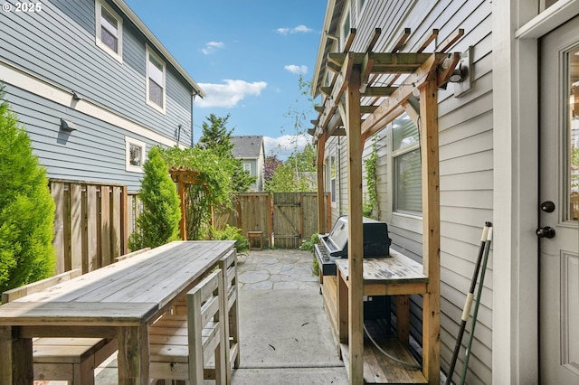 665 NE Skidmore St, Portland, OR 97211 - view of patio / terrace featuring a gate and outdoor dining space