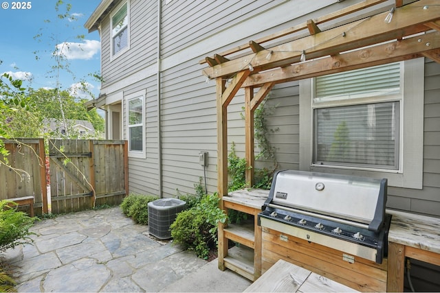 665 NE Skidmore St, Portland, OR 97211 - view of patio / terrace with grilling area, a pergola, and a gate