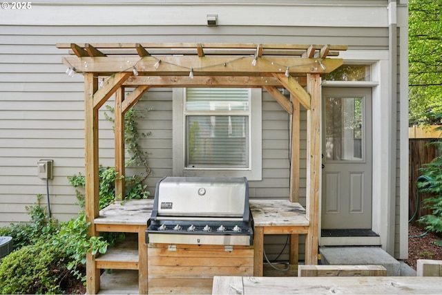 665 NE Skidmore St, Portland, OR 97211 - view of patio / terrace with area for grilling and a pergola