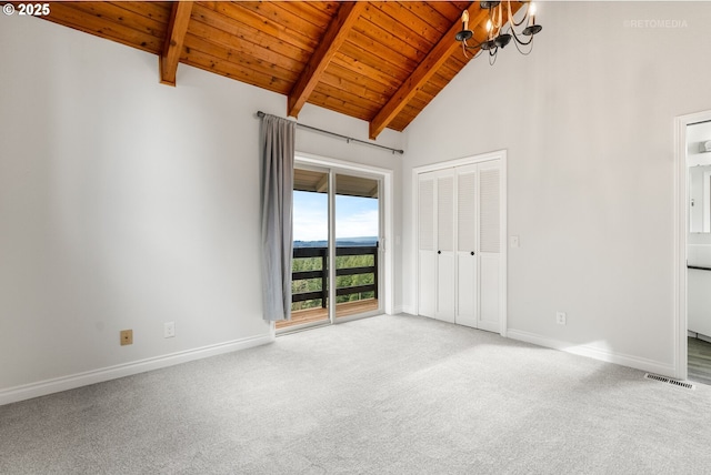 20740 S Shelley Ln, Beavercreek, OR 97004 - unfurnished bedroom with a wooden ceiling with exposed beams, carpet flooring, access to outside, high vaulted ceiling, and a chandelier