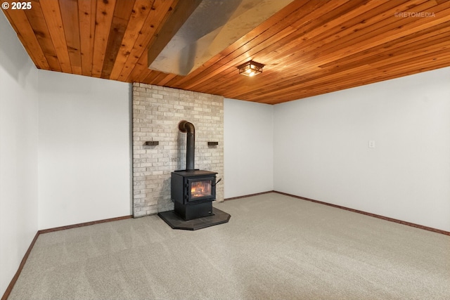 20740 S Shelley Ln, Beavercreek, OR 97004 - unfurnished living room with wooden ceiling, carpet floors, and a wood stove