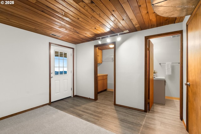 20740 S Shelley Ln, Beavercreek, OR 97004 - unfurnished room with wooden ceiling and light wood-style flooring