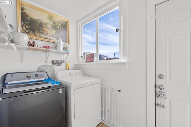 laundry room featuring separate washer and dryer