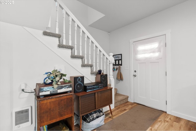 foyer with hardwood / wood-style floors