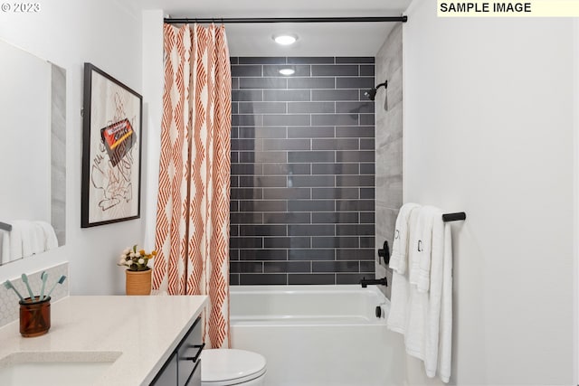 full bathroom featuring vanity, toilet, and shower / bath combo with shower curtain