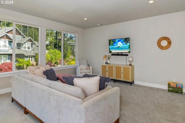 living room featuring recessed lighting, visible vents, carpet flooring, and baseboards