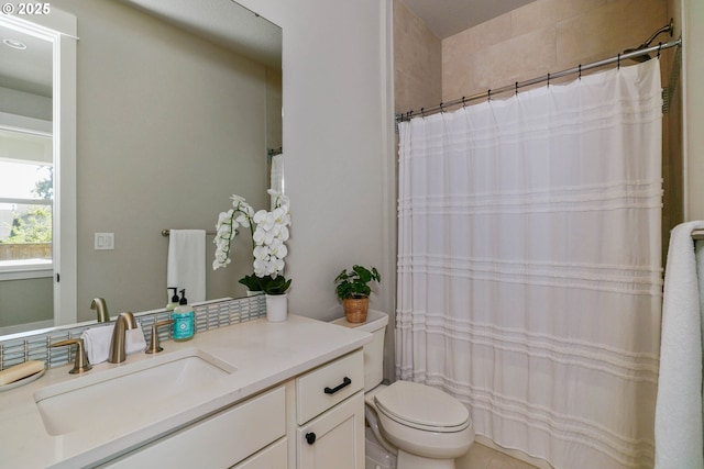 full bath with vanity, toilet, and a shower with shower curtain