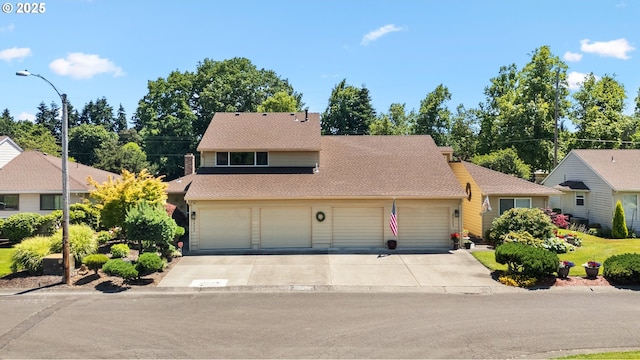 2935 Cedarwood Ct, Albany, OR 97322 - view of front of property with driveway, a shingled roof, and a garage