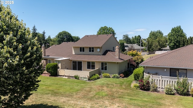 2935 Cedarwood Ct, Albany, OR 97322 - back of house featuring a chimney and roof with shingles