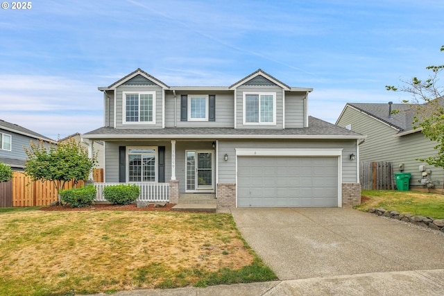 16099 SE Venice Ridge Way, Damascus, OR 97089 - view of front of home with a porch, concrete driveway, brick siding, and an attached garage
