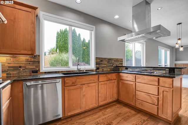 16099 SE Venice Ridge Way, Damascus, OR 97089 - kitchen with appliances with stainless steel finishes, island range hood, a peninsula, recessed lighting, and light wood-style floors