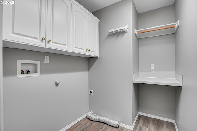 16099 SE Venice Ridge Way, Damascus, OR 97089 - washroom featuring cabinet space, electric dryer hookup, wood finished floors, and hookup for a washing machine